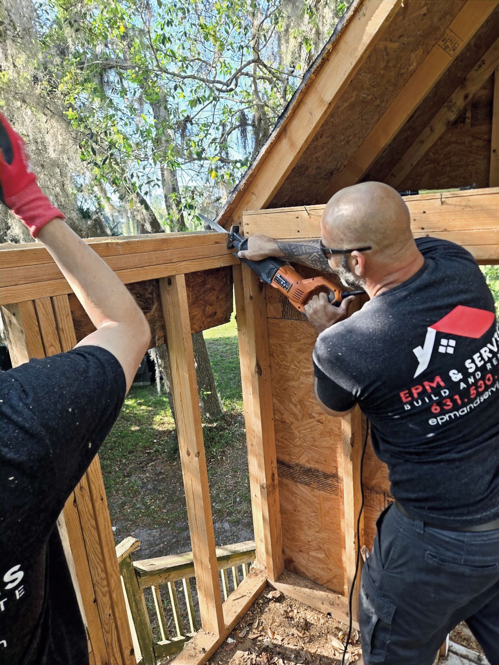 EPM & Services crew performing demolition framing work in Eustis, FL