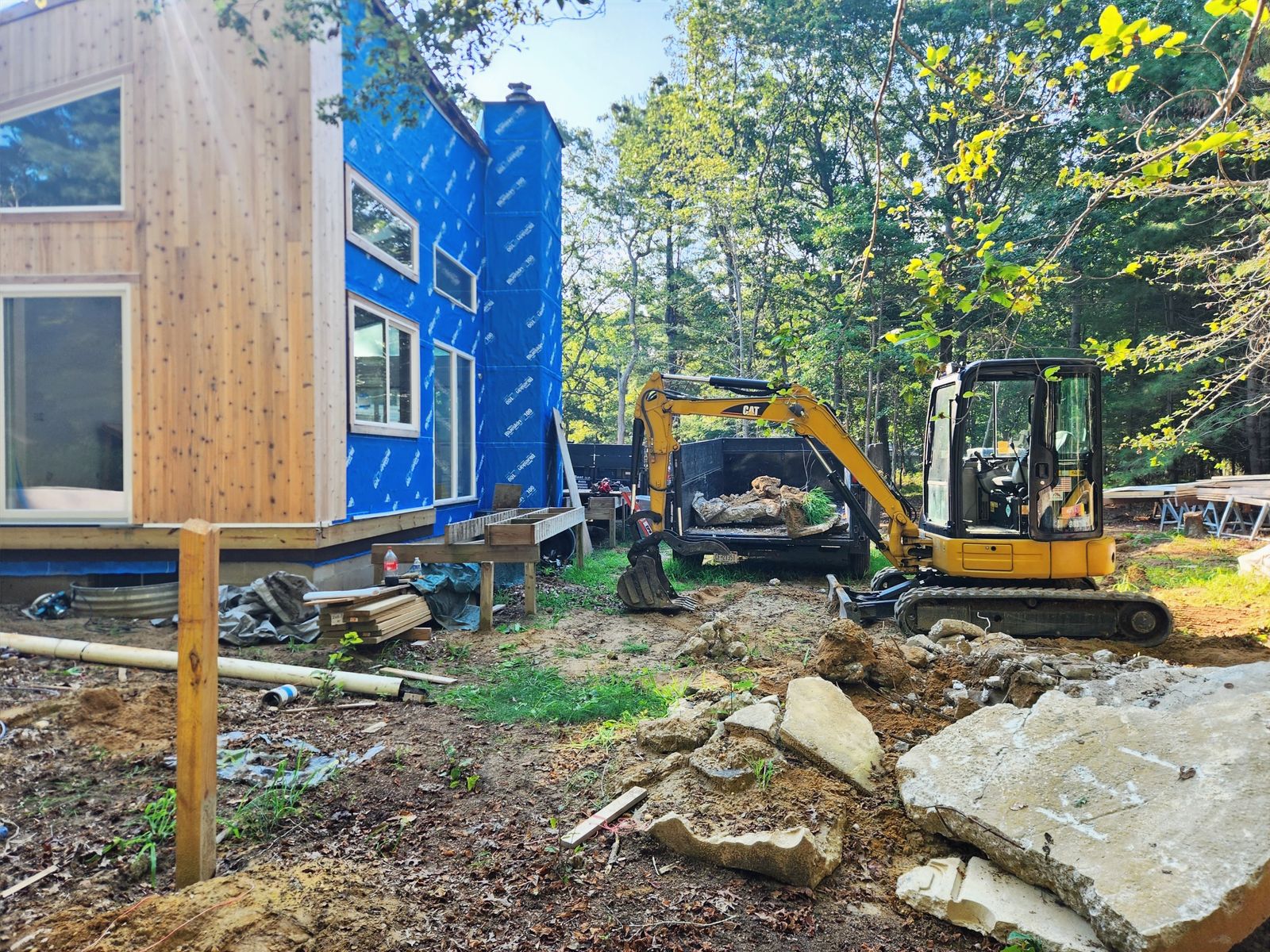 Mini excavator on a residential demolition site in Lake County, Florida