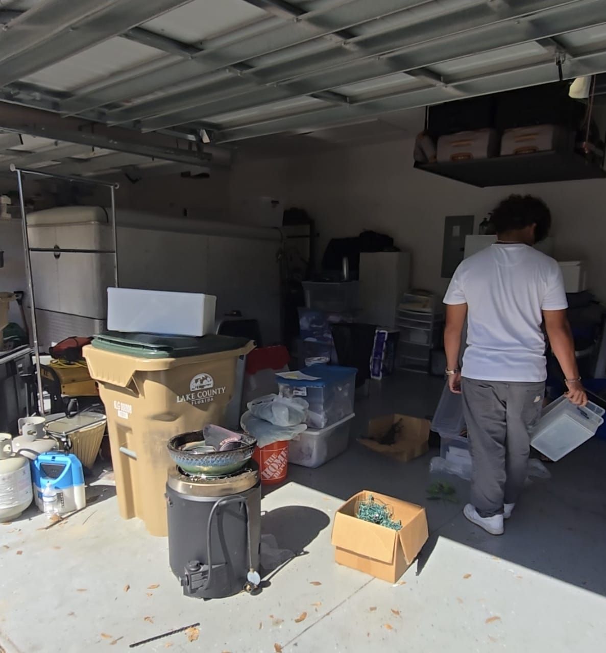 Garage cleanout in progress for a Lake County, Florida home